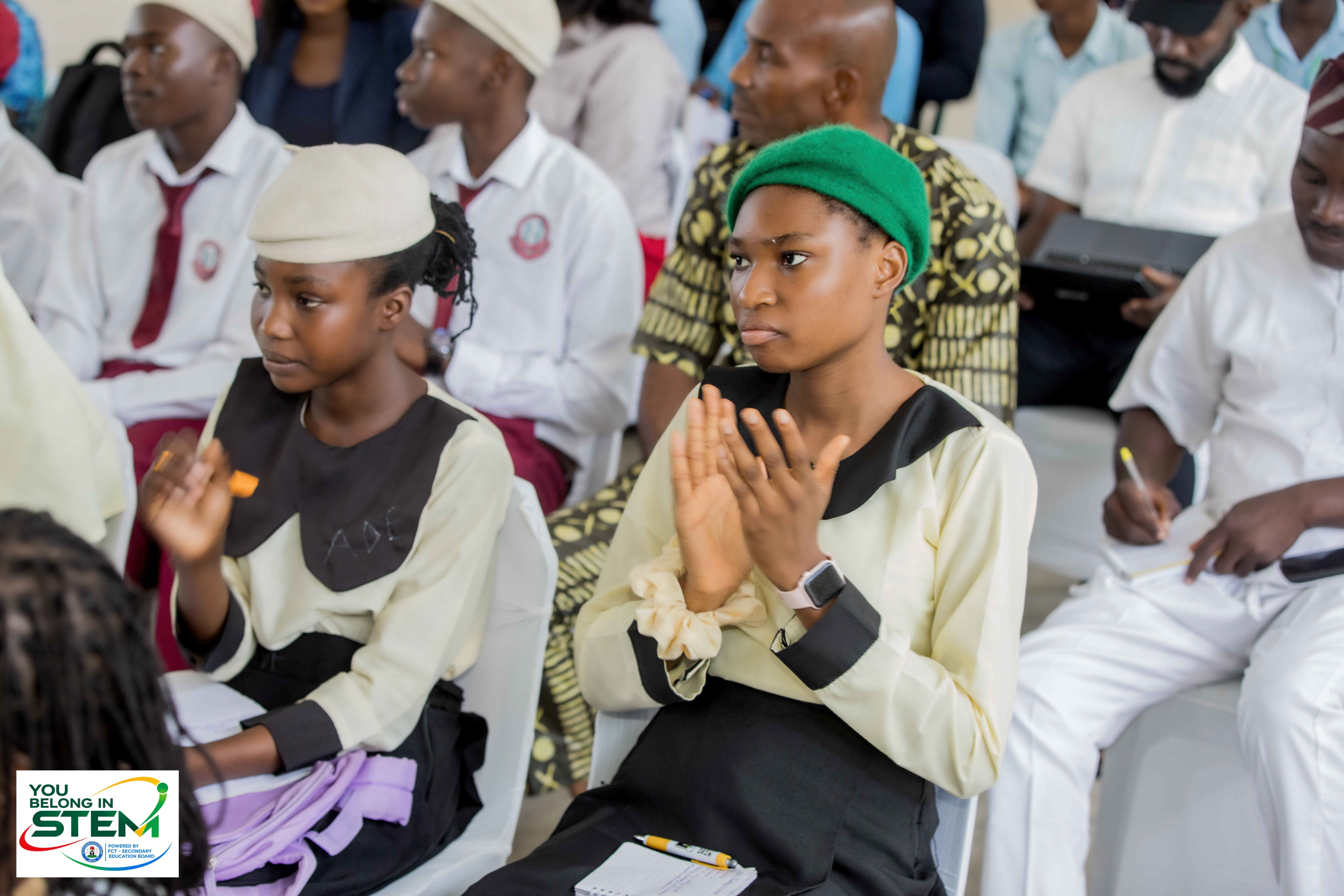 Students applauding at the You Belong in STEM FCT Edition event
